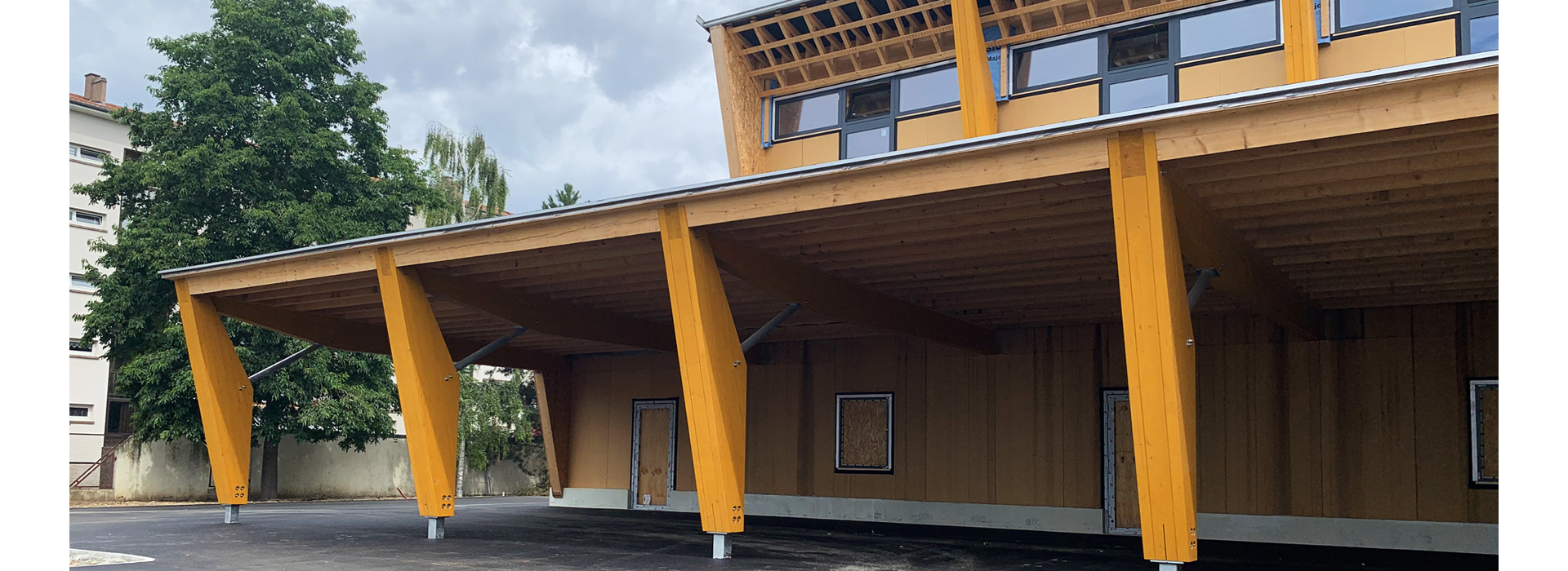 Salle de jeux charpente bois école passive Libermann