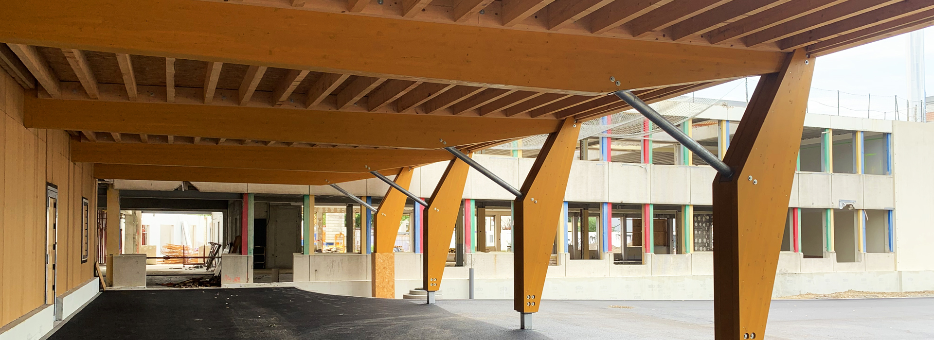Salle de jeux charpente bois école passive Libermann